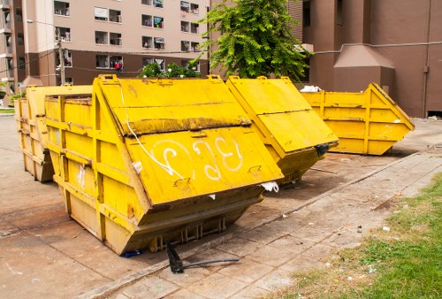 Local waste collection team handling rubbish removal in London street settings