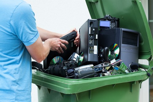Professional litter clearance crew working on a London property